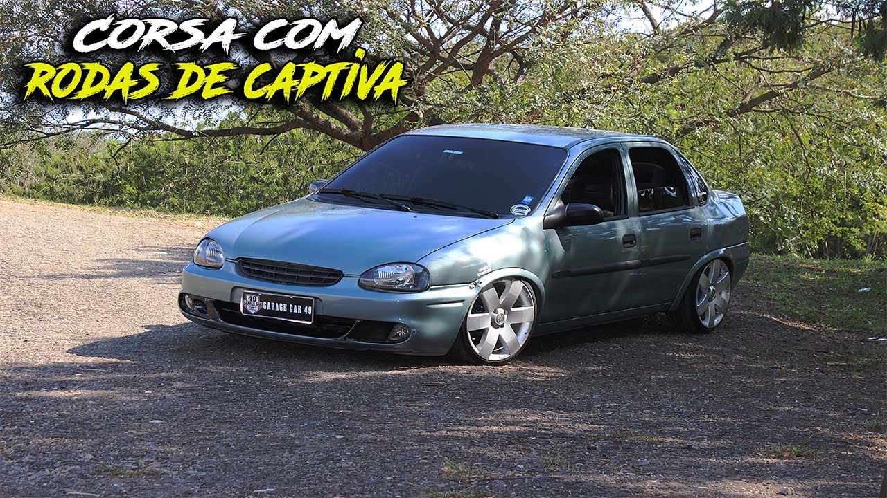 Corsa Sedan 2001 rebaixado com rodas de Cruze e 1000w de som