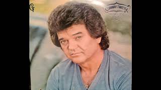 Video thumbnail of "Conway Twitty - Rest Your Love On Me"