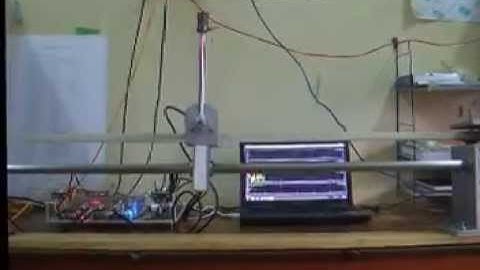 Swing-Up Energy and Stabilization LQR Controllers for an Inverted Pendulum System