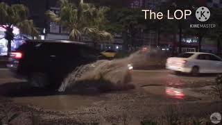 Oblivious drivers hitting HUGE potholes (Compilation)