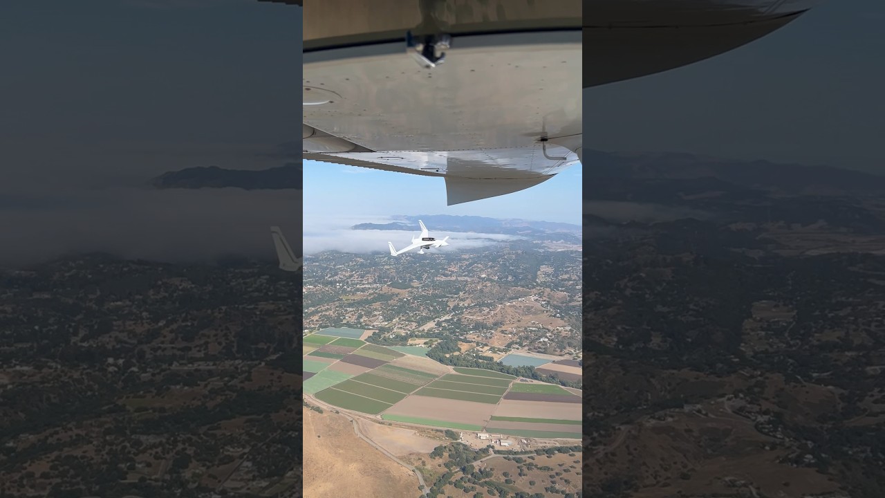 Rutan Long-EZ flying past a Cessna 150!