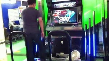 Bryan playing DDR X2 in Akihabara, Tokyo
