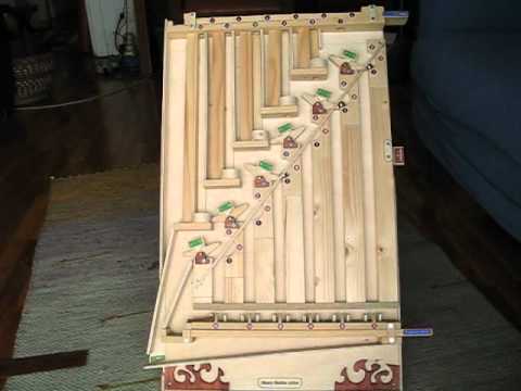 Binary Marble Machine - Calcolatore analogico a palline - Esempio: somma 11 + 25 = 36 con commento