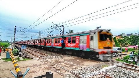 High Speed New Ad-Printed Colourful EMU local Train Heatedly Riding Out At Railgate