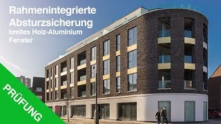 So funktioniert eine rahmenintegrierte Absturzsicherung bei breiten Holz Aluminium Fenster