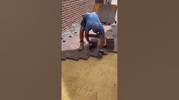 The process of installing bricks in the large yard next to the house is easy and fast #construction