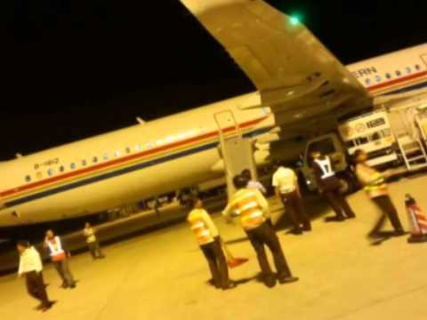 Passenger deploys, slides down plane's emergency chute on his own