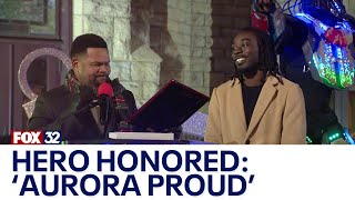 Local hero honored during Aurora's holiday festivities