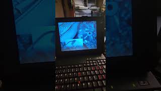 Booting Windows 95 on a 486 laptop.
