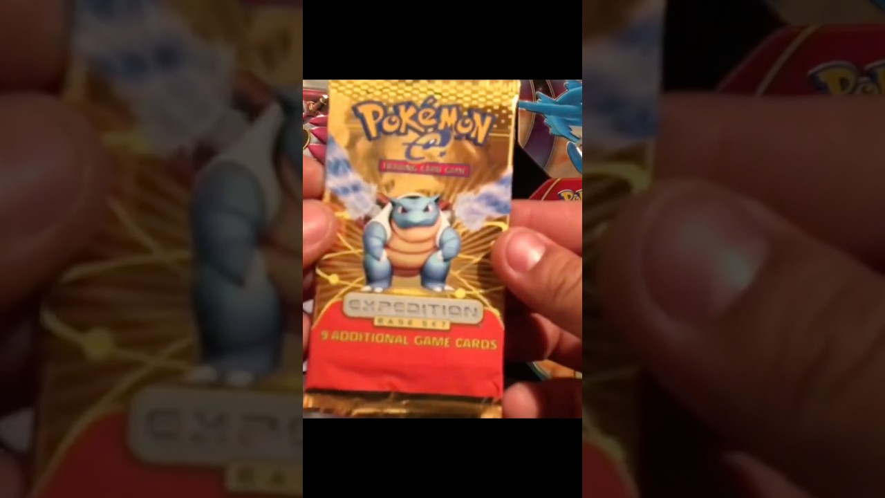 Распаковка бустера из базового набора Pokemon 