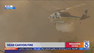 Firefighter hospitalized after crash while battling Canyon Fire