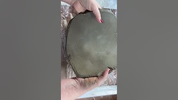 How to hand roll a clay slab for building sculpture by using bats, board and a rolling pin