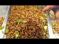 Night food market in Thailand selling edible bugs. Eating insects in Krabi Thailand. Bizarre foods!