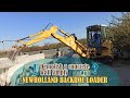 New holland Backhoe Loader - Demolish a concrete wall simply - backhoe at work