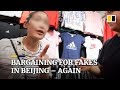 Bargaining for fakes on Beijing's Silk Street – again