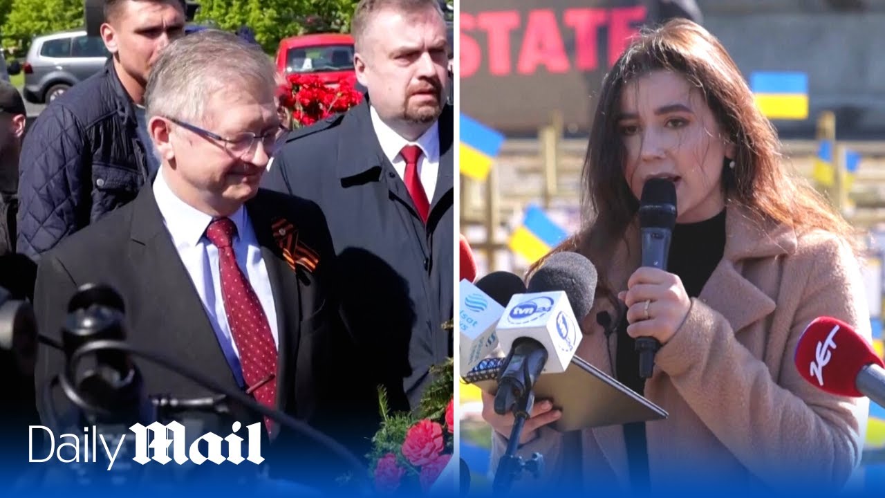 Activists in Poland stop Russian ambassador entering Soviet cemetery