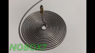Coiling bending and rolling metal tubing