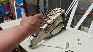 Properly installing and tightening a chainsaw chain.