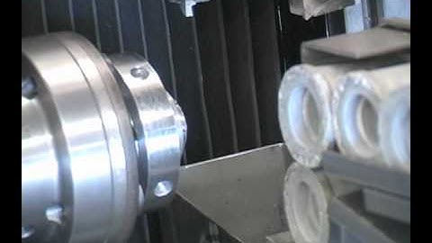 Automatic loader on CNC OmniTurn lathe