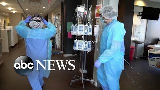 Surges in COVID, flu and RSV cases overwhelm hospitals ahead of holidays