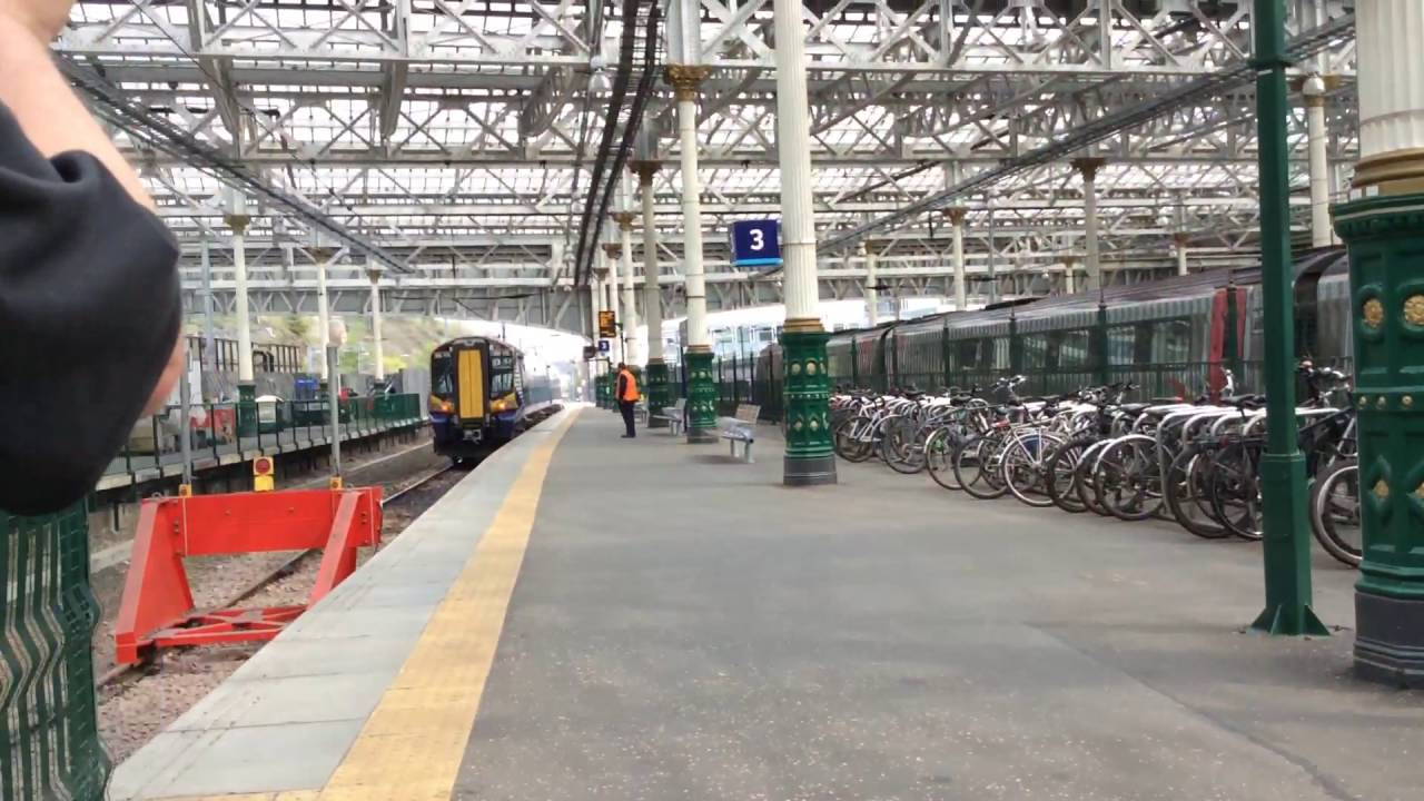 380105 leaves platform 3, Edinburgh