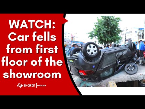 Car overturns from first floor of the showroom in Hyderabad | Car accident in Hyderabad | ETV Bharat