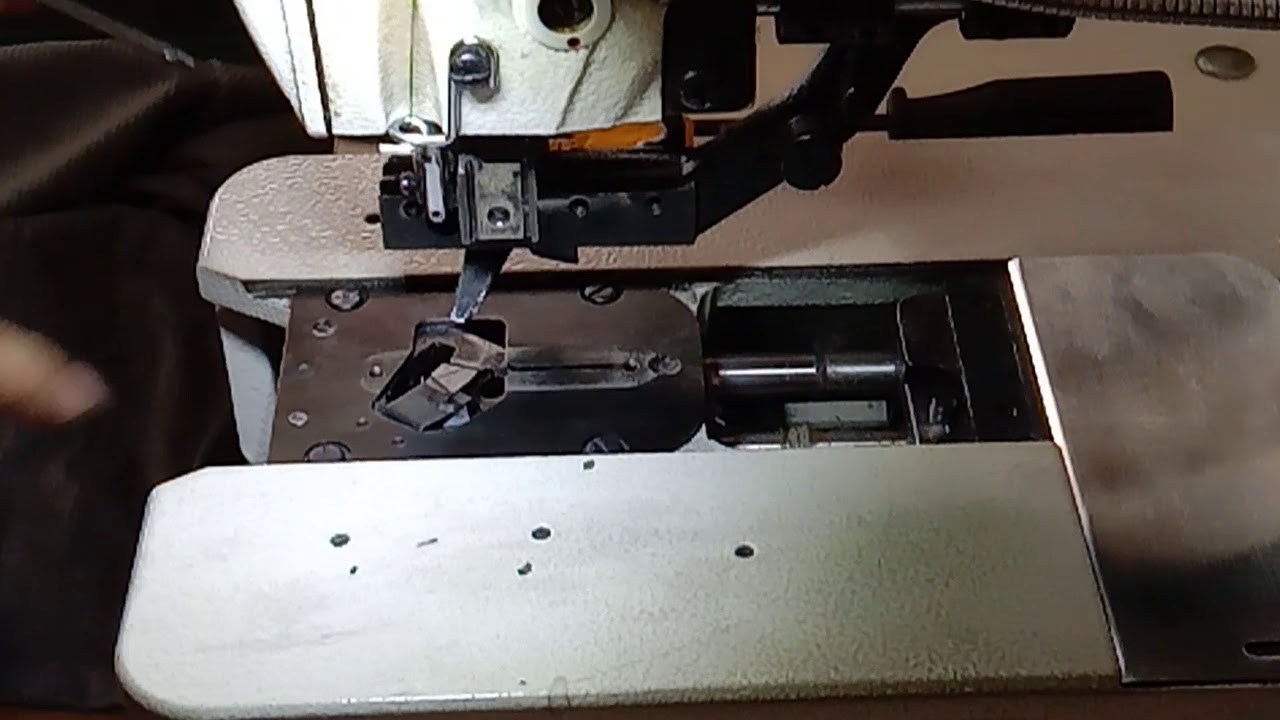 cara membersihkan deklat bagian pisau bawah mesin lubang kancing