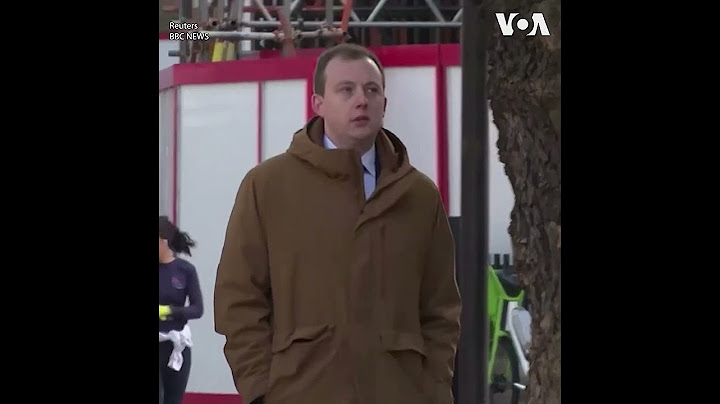 两名被指控为中国充当间谍的英国人在伦敦出庭