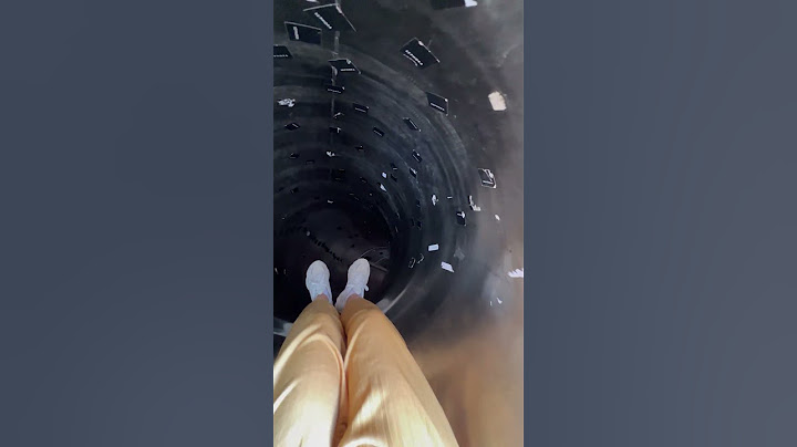Girl goes down a slide in Sephora in Barcelona!