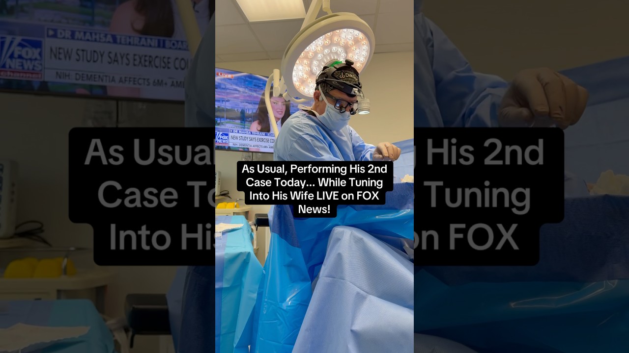 While operating on his third patient of the day, Dr. Taj keeps up with his wife’s live appearance!