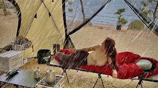 Soaked girl camping in a big tent in the rain on the beach  ASMR