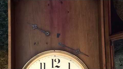 Antique wind up clock conversion to Atomic clock
