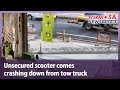 Unsecured scooter comes crashing down from tow truck|Taiwan News