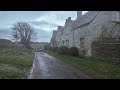 A damp  dark morning walk through a cotswold village  countryside  england