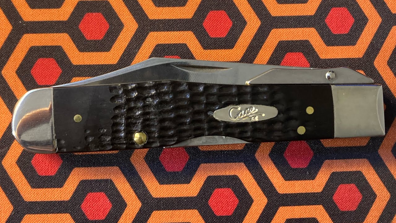Case Cheetah Jigged Black Synthetic Locking Clip Blade Swing Guard case-cheetah-jigged-black-synthetic-locking-clip-blade-swing-guard