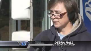 Postal 'Hero' Saves Elderly Woman