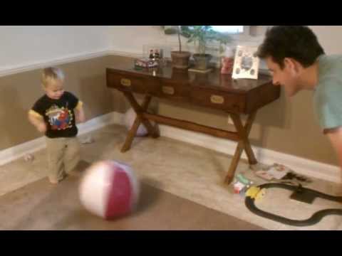 Toren kicking ball with Ryan