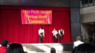 Lambda Phi Epsilon brothers step