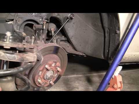 How-To Replace Front Struts on Most Cars : 2001 Mazda Protege Example