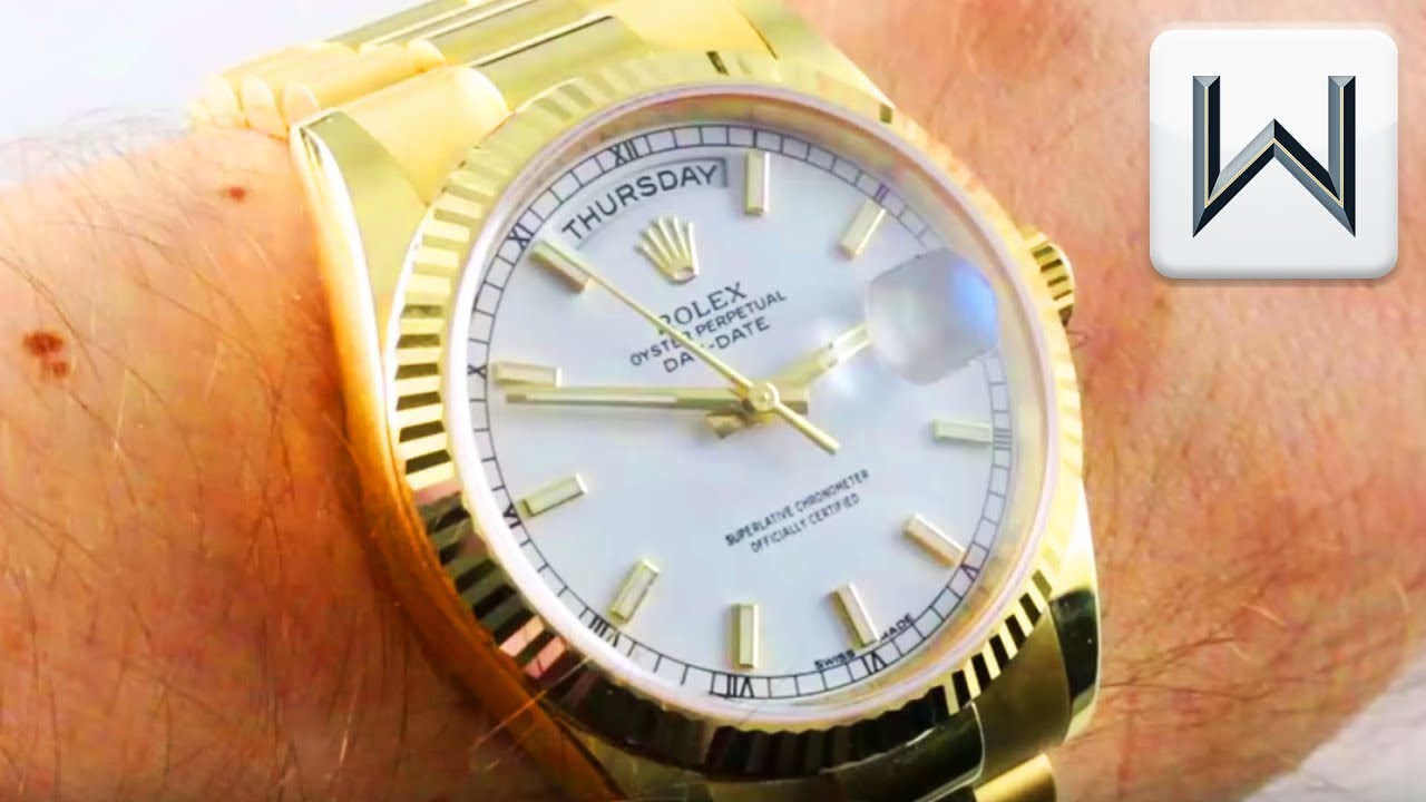 gold rolex with white face