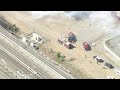 Watch: Brush fire burns near BART tracks in Hayward
