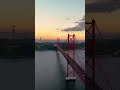 Capturing the stunning beauty of Lisbon’s iconic bridge as it stretches across the Tagus River 🌉✨