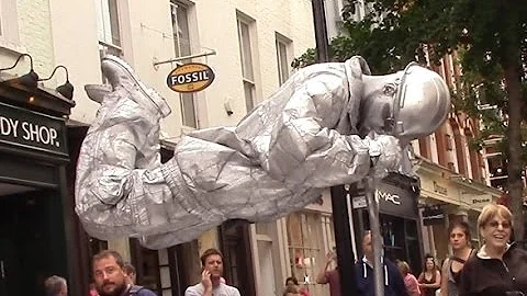 Silver man secret revealed London street performer, floating and levitating trick