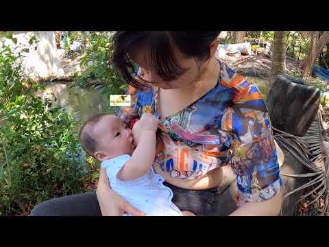 Breastfeeding on a broken boat in my parents' home