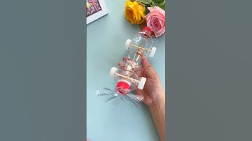 Maak een auto met een waterfles: gooi die fles niet weg! Leer hoe je een leuke, door de wind aang...