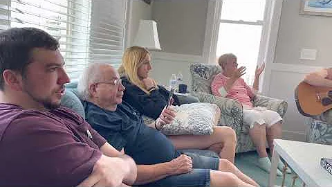 Rowse family singing about Jesus at beach house