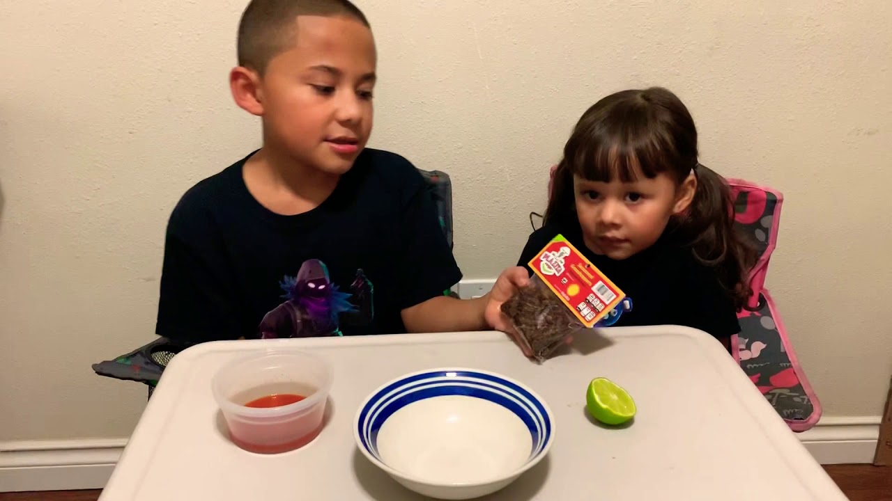 Grasshopper Challenge. The kiddos try out grasshoppers.