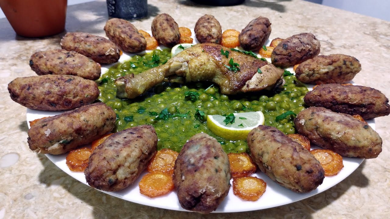 عجيجات القرنون بالدجاج والجلبانة طعم لا يقاوم! 😍Boulettes de cœurs d’artichauts et petits pois