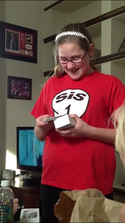 Girl Drops New iPhone While Unboxing
