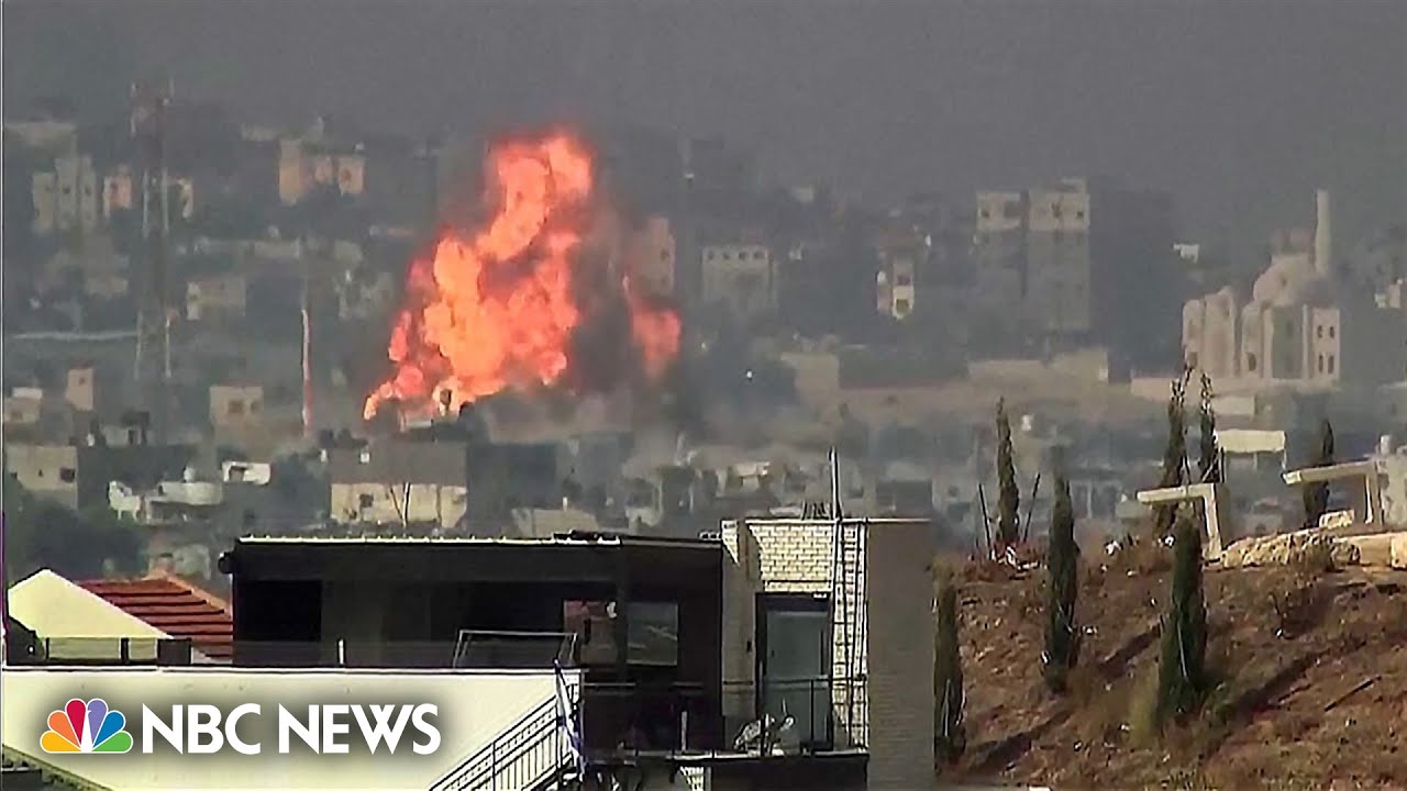 Videos show a huge explosion and rockets launched from the Gaza Strip